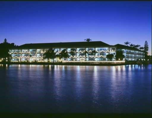 2895 Northeast 32nd Street, Unit 206 Fort Lauderdale, FL 33306 - Photo 2 of 22 a view of a lake with a mountain