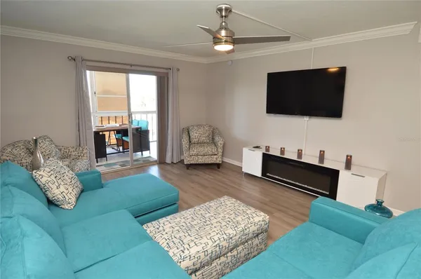 a view of hallway with wooden floor