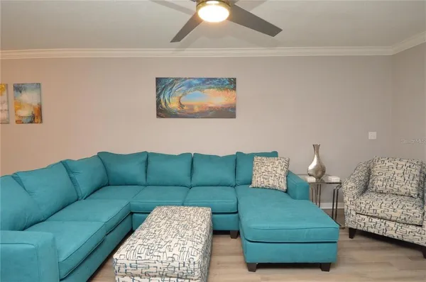 a bedroom with a bed and flat screen tv