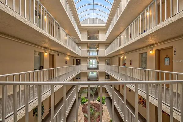 a kitchen with a stove top oven and cabinets
