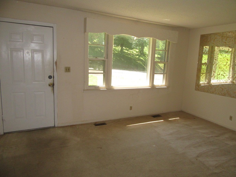 107 Jay Circle Clarksville, TN 37040 - Photo 3 of 12 an empty room with windows