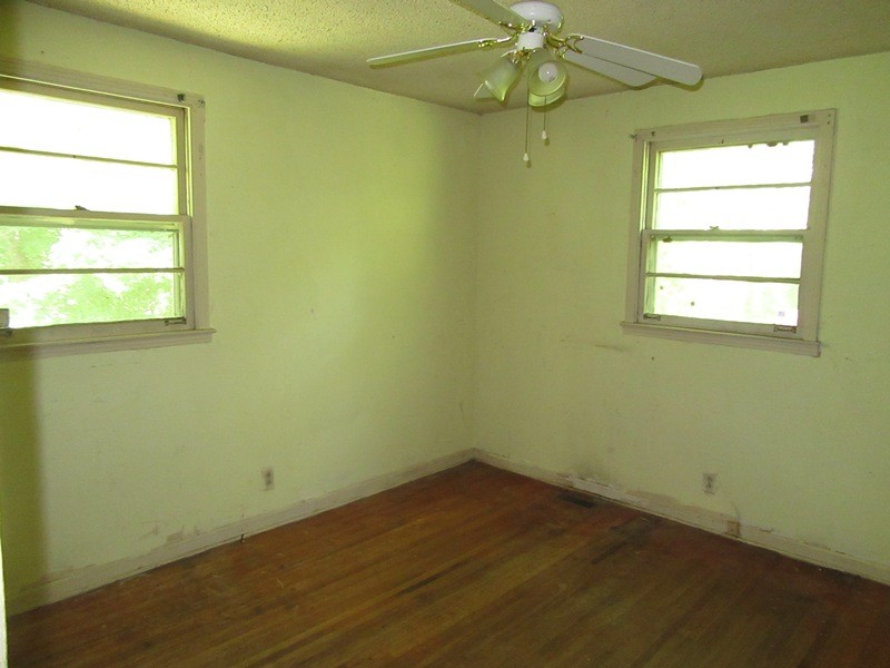 107 Jay Circle Clarksville, TN 37040 - Photo 9 of 12 an empty room with a window and a fan