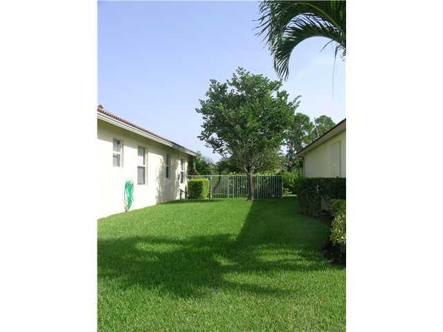2927 Southeast Racoon Way Stuart, FL 34997 - Photo 15 of 22 a view of a backyard