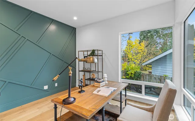 a view of a patio with a table and chairs