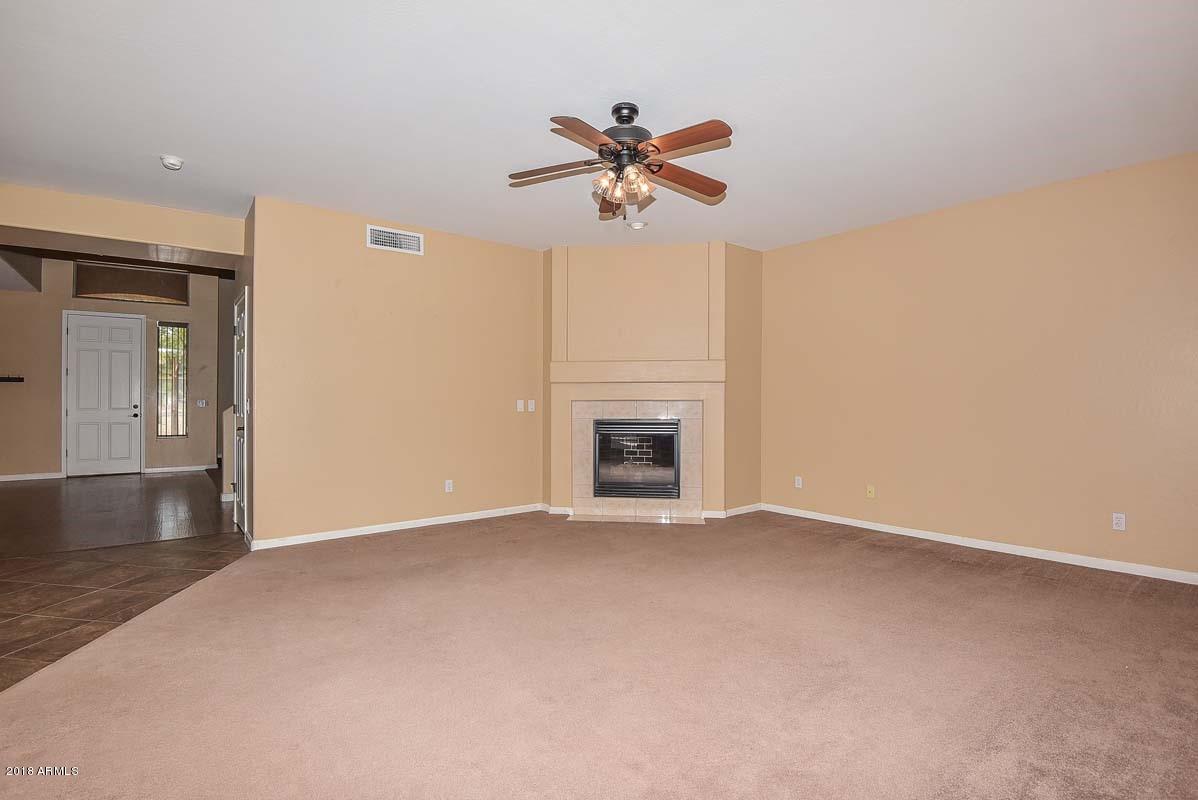 8409 North Citrus Road Waddell, AZ 85355 - Photo 36 of 74 Family Room-Fireplace (1)