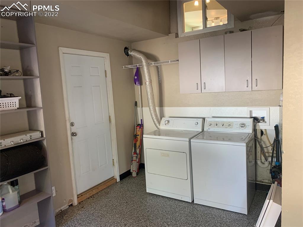 2906 High Street Pueblo, CO 81008 - Photo 13 of 25 a view of storage and utility room with washer and dryer