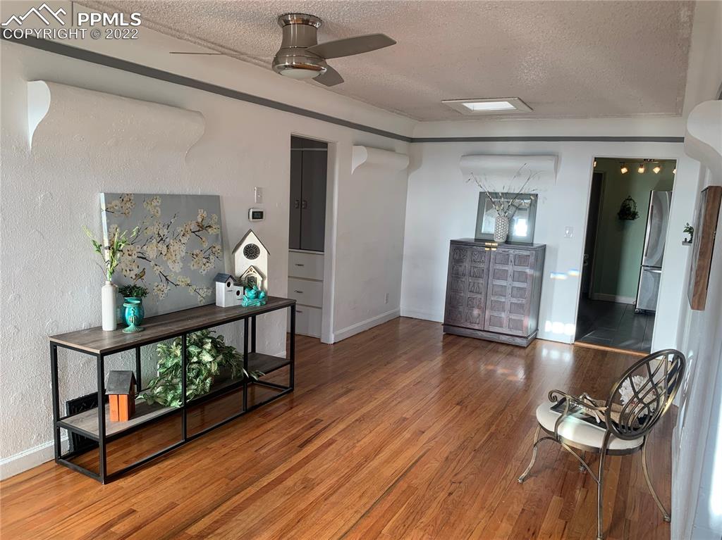 2906 High Street Pueblo, CO 81008 - Photo 5 of 25 a view of a livingroom with furniture and wooden floor