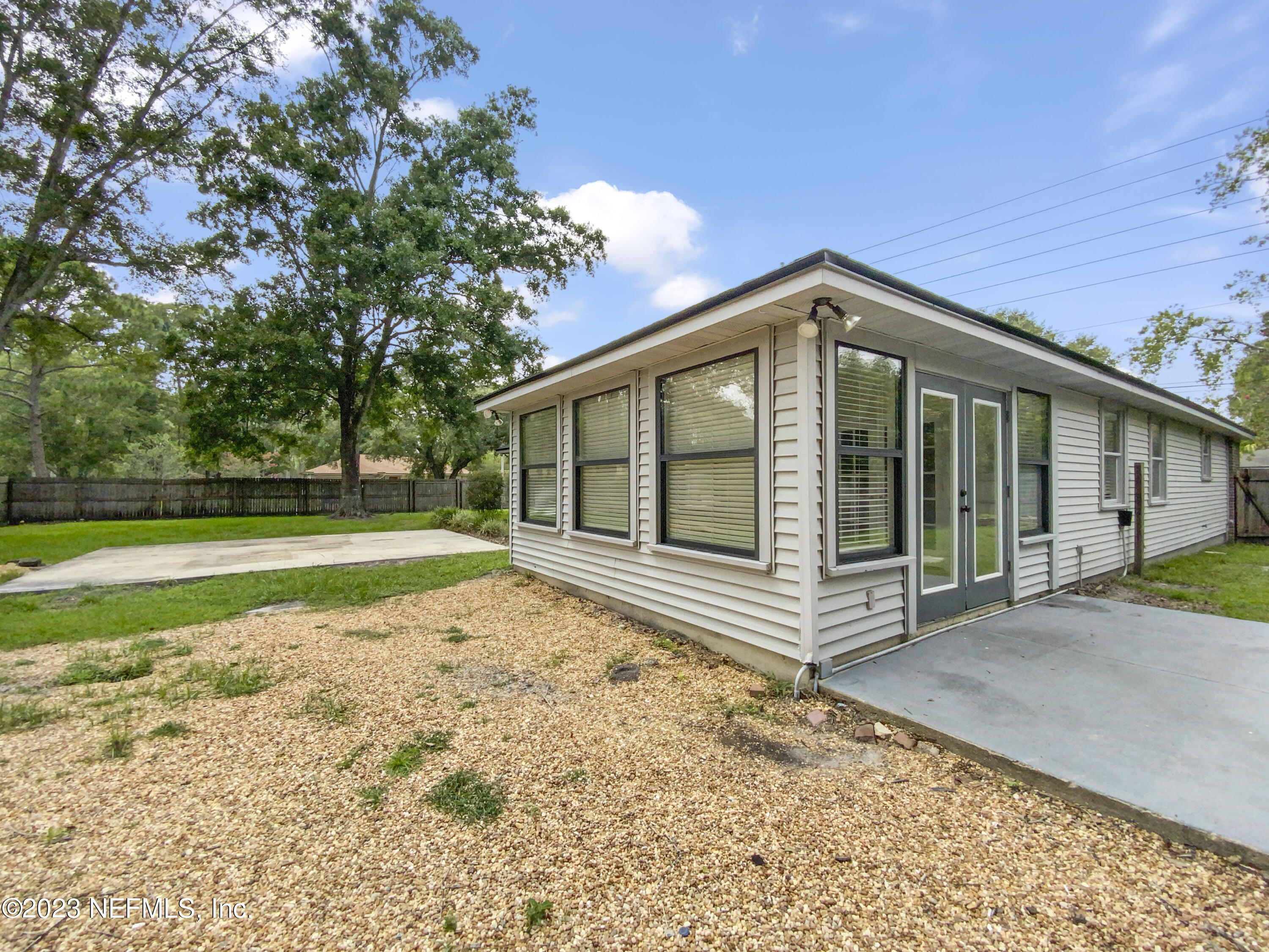 3550 Loretto Road Jacksonville, FL 32223 - Photo 17 of 19 a view of a house with a backyard