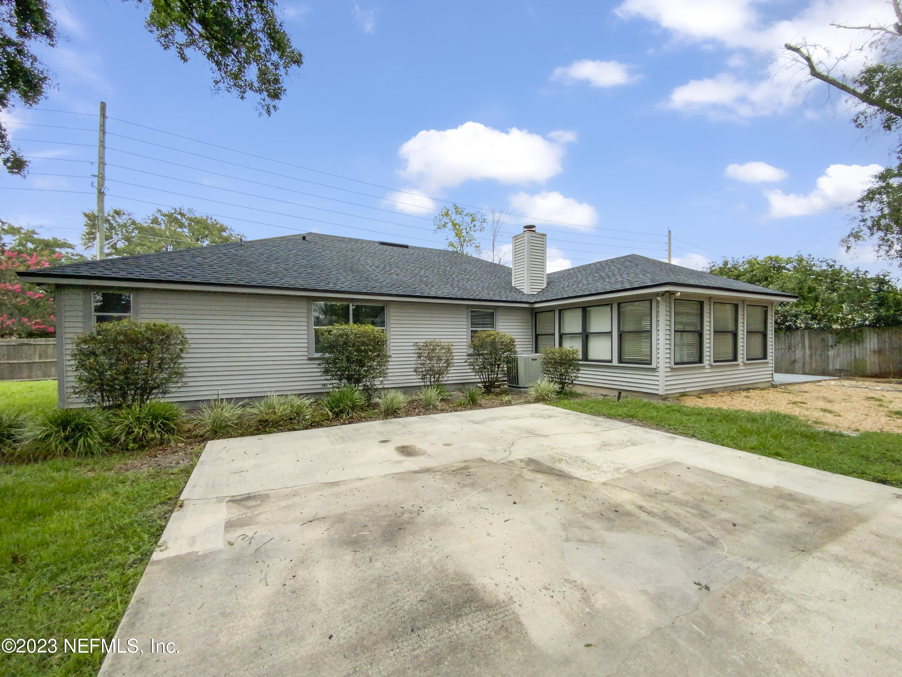 3550 Loretto Road Jacksonville, FL 32223 - Photo 18 of 19 a front view of a house with garden