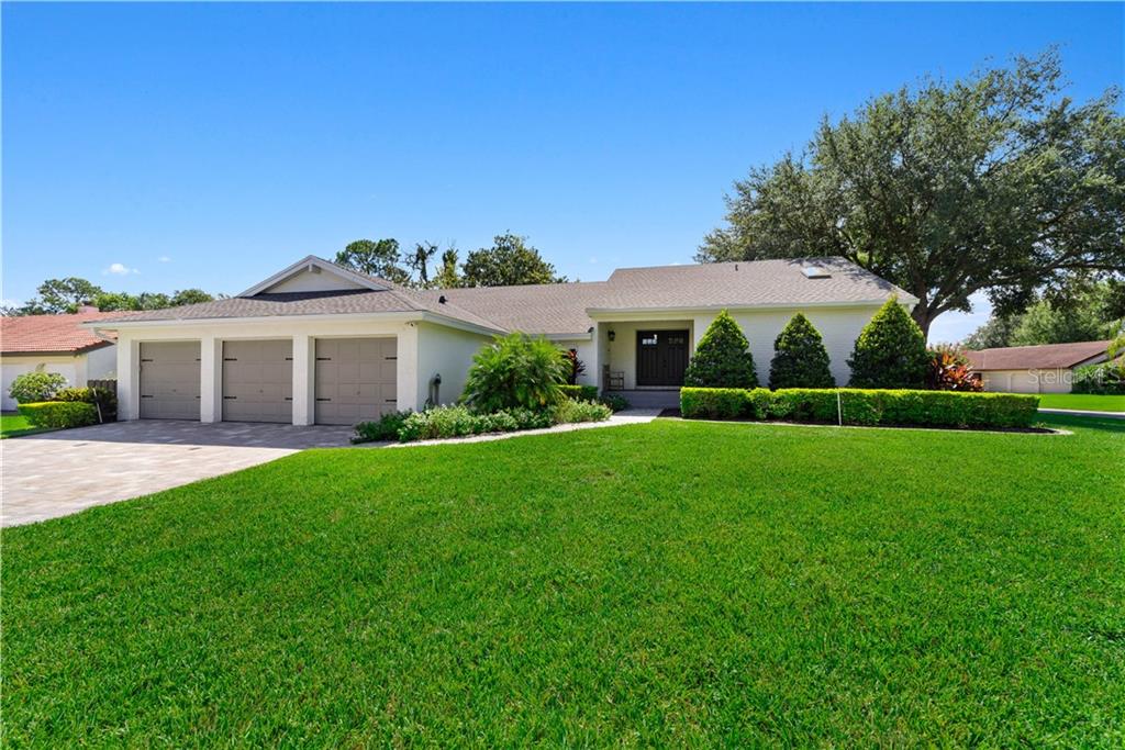 7462 Sparkling Lake Road Orlando, FL 32819 - Photo 1 of 1 Welcome Home! Large corner lot w/ brick paver driveway.