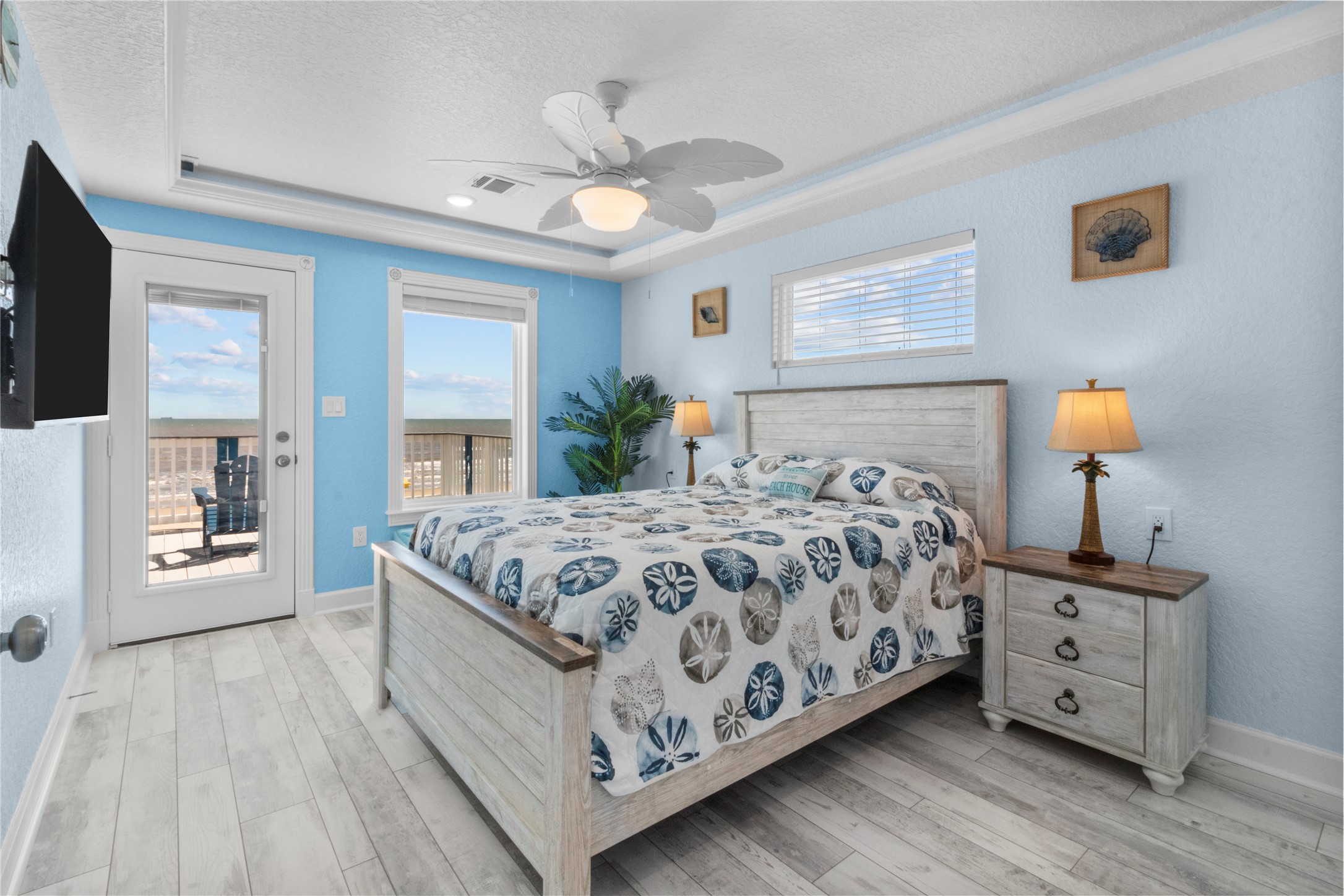 622 Fin Alley Surfside Beach, TX 77541 - Photo 12 of 33 The beachfront view from the master bedroom windows is AMAZING!!! Master bedroom. Direct balcony access from bedroom.