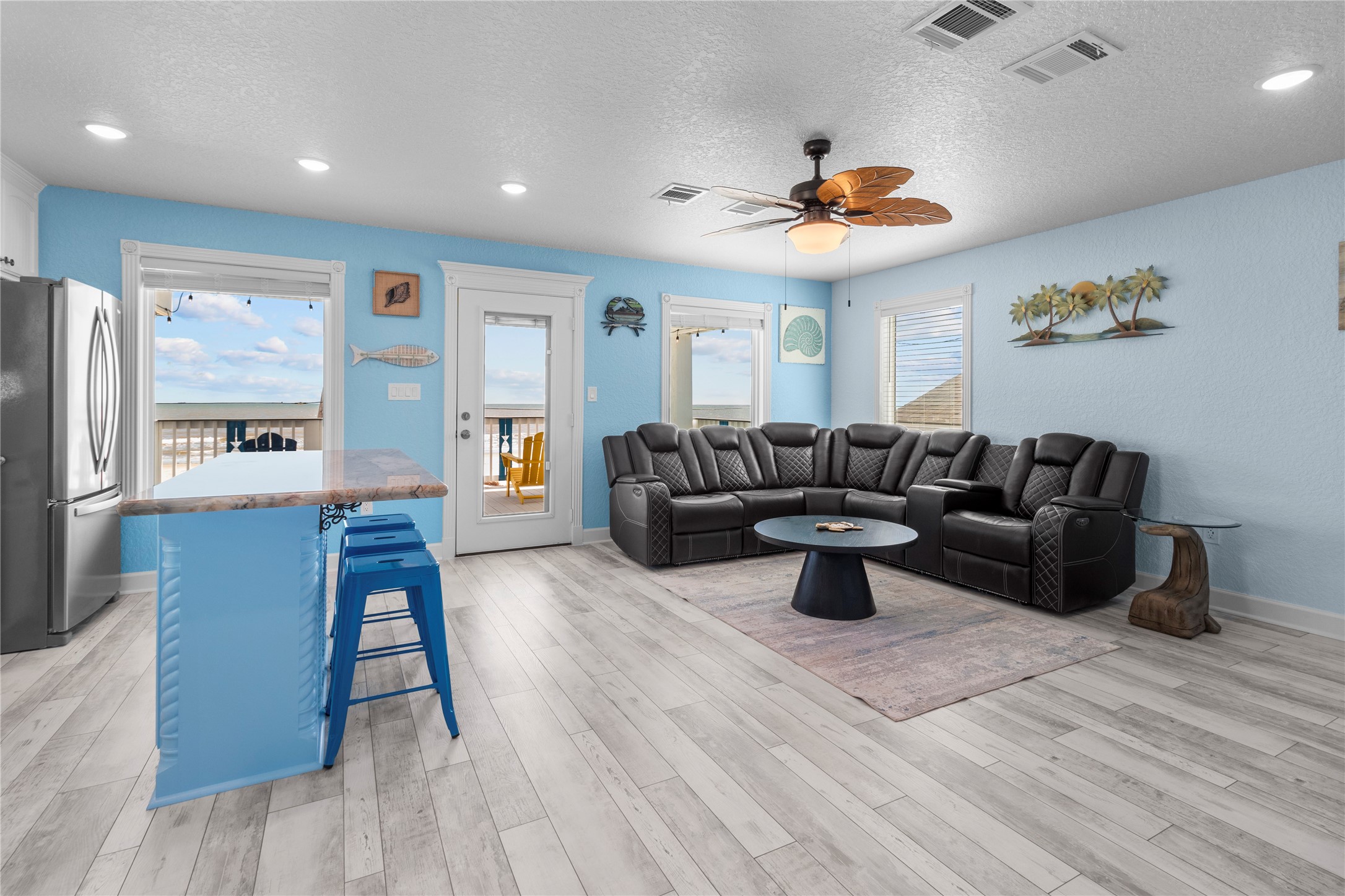 622 Fin Alley Surfside Beach, TX 77541 - Photo 23 of 33 Power reclining leather sofa.