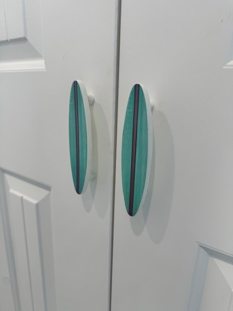 622 Fin Alley Surfside Beach, TX 77541 - Photo 32 of 33 Decorative knobs add to the coastal theme.