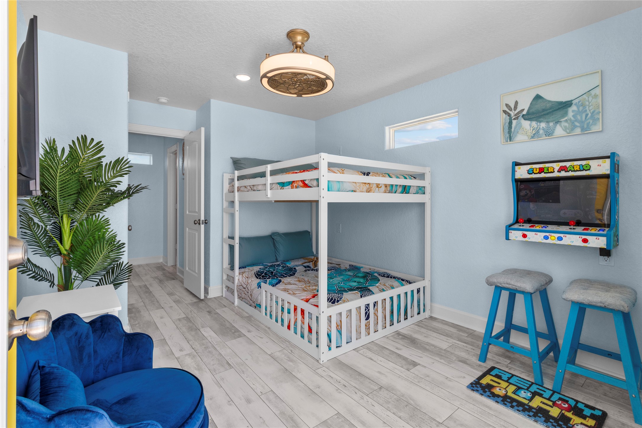 622 Fin Alley Surfside Beach, TX 77541 - Photo 10 of 33 Video arcade game, TV and bunk beds.
