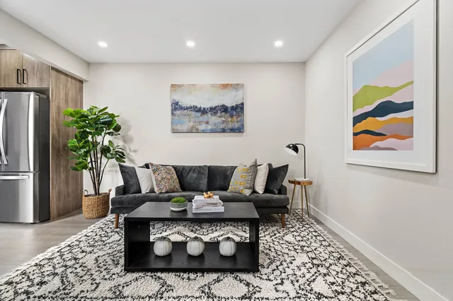 a view of a patio with a table and chairs