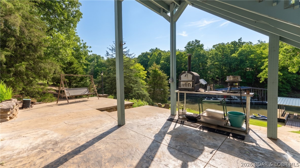 490 Waterfowl Road Linn Creek, MO 65052 - Photo 32 of 52 Lakeside Patio Stamped Concrete