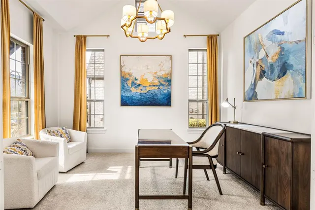a view of a livingroom with furniture and window