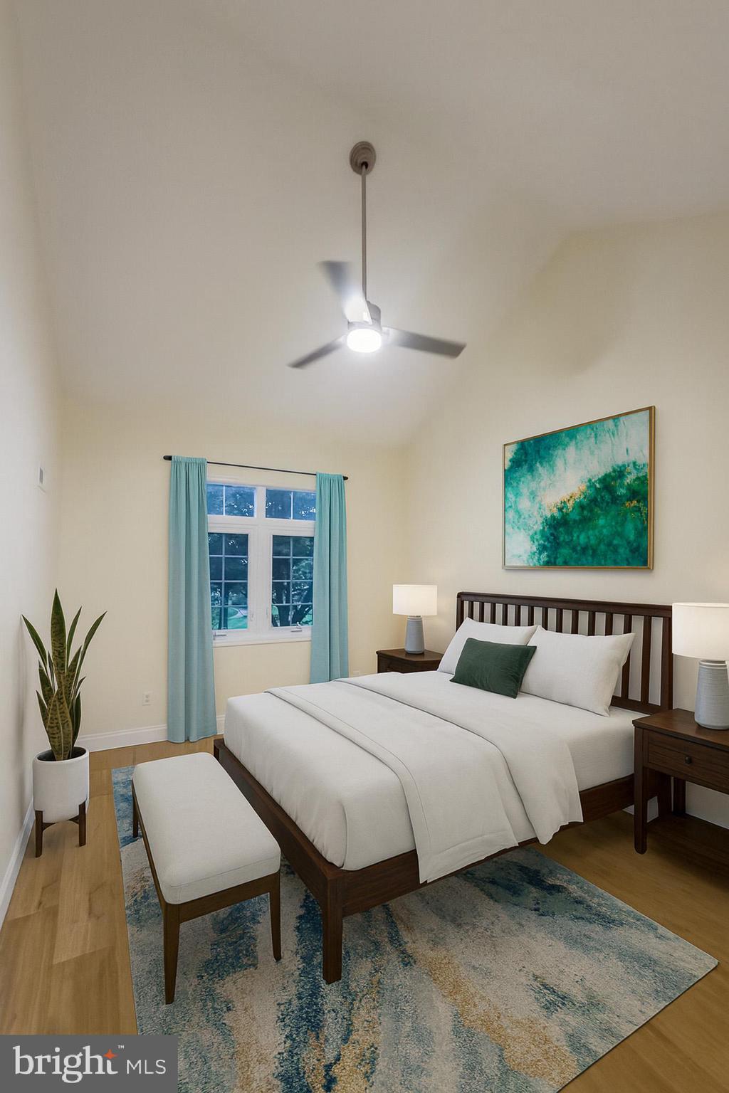 7 C Rutland Lane Monroe Township, NJ 08831 - Photo 17 of 41 a bedroom with a bed a couch and potted plant with the dresser