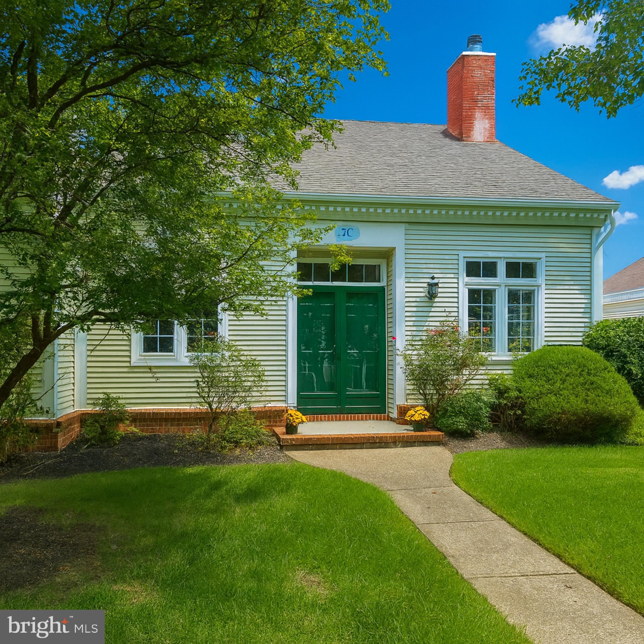 7 C Rutland Lane Monroe Township, NJ 08831 - Photo 2 of 41 a front view of a house with a yard