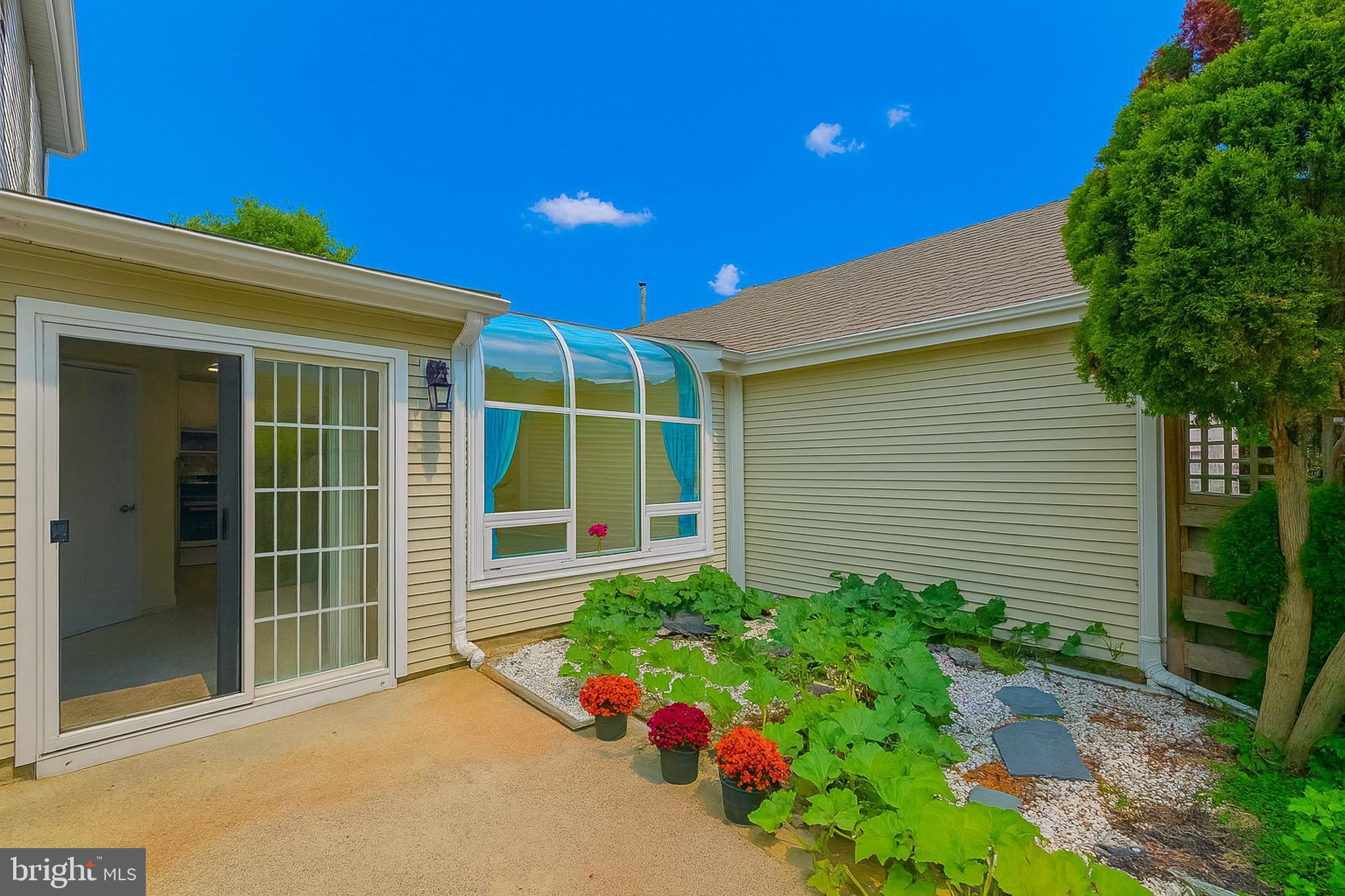 7 C Rutland Lane Monroe Township, NJ 08831 - Photo 28 of 41 a house with a yard