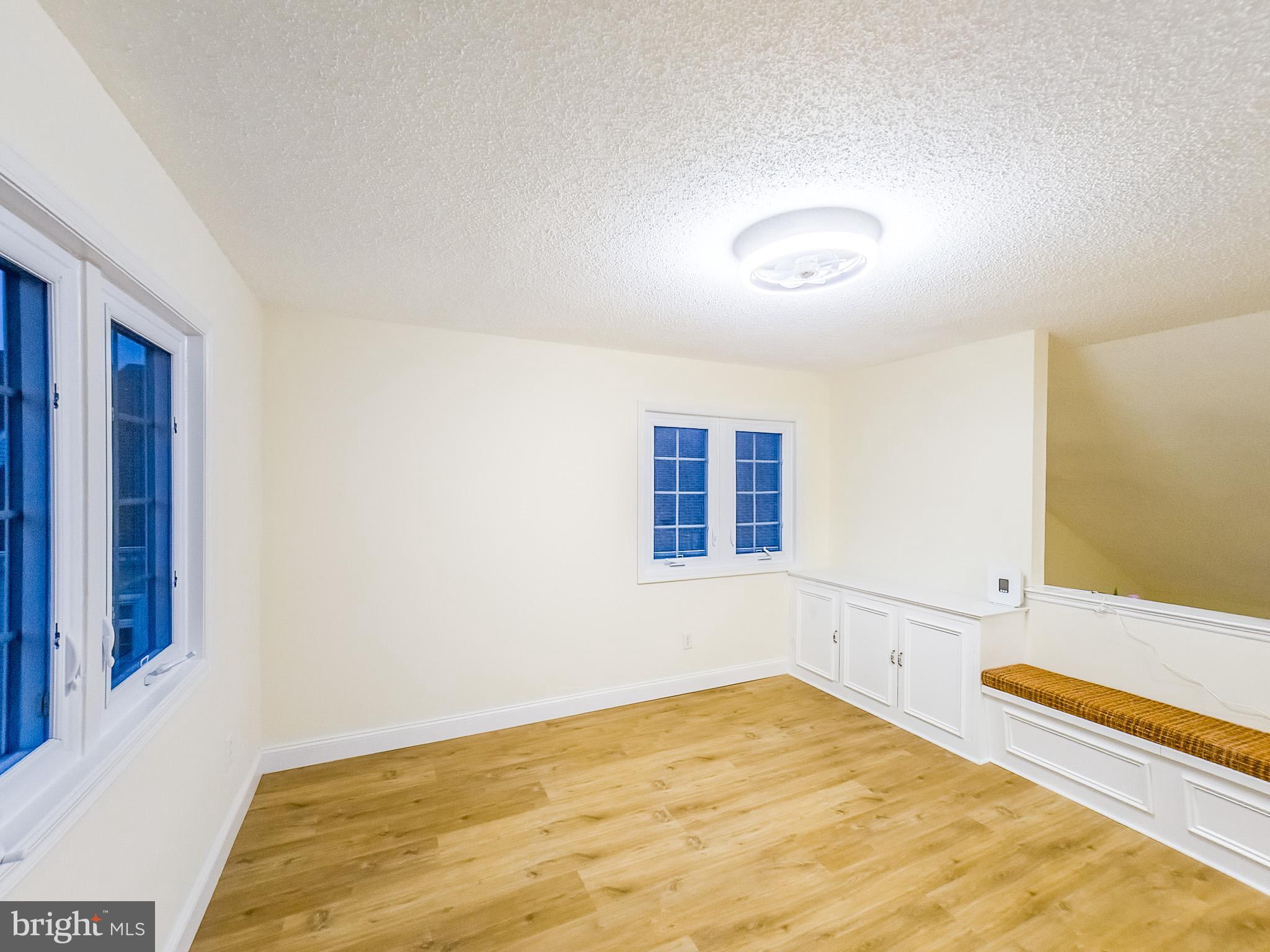 7 C Rutland Lane Monroe Township, NJ 08831 - Photo 36 of 41 a view of a room with a bed and a window