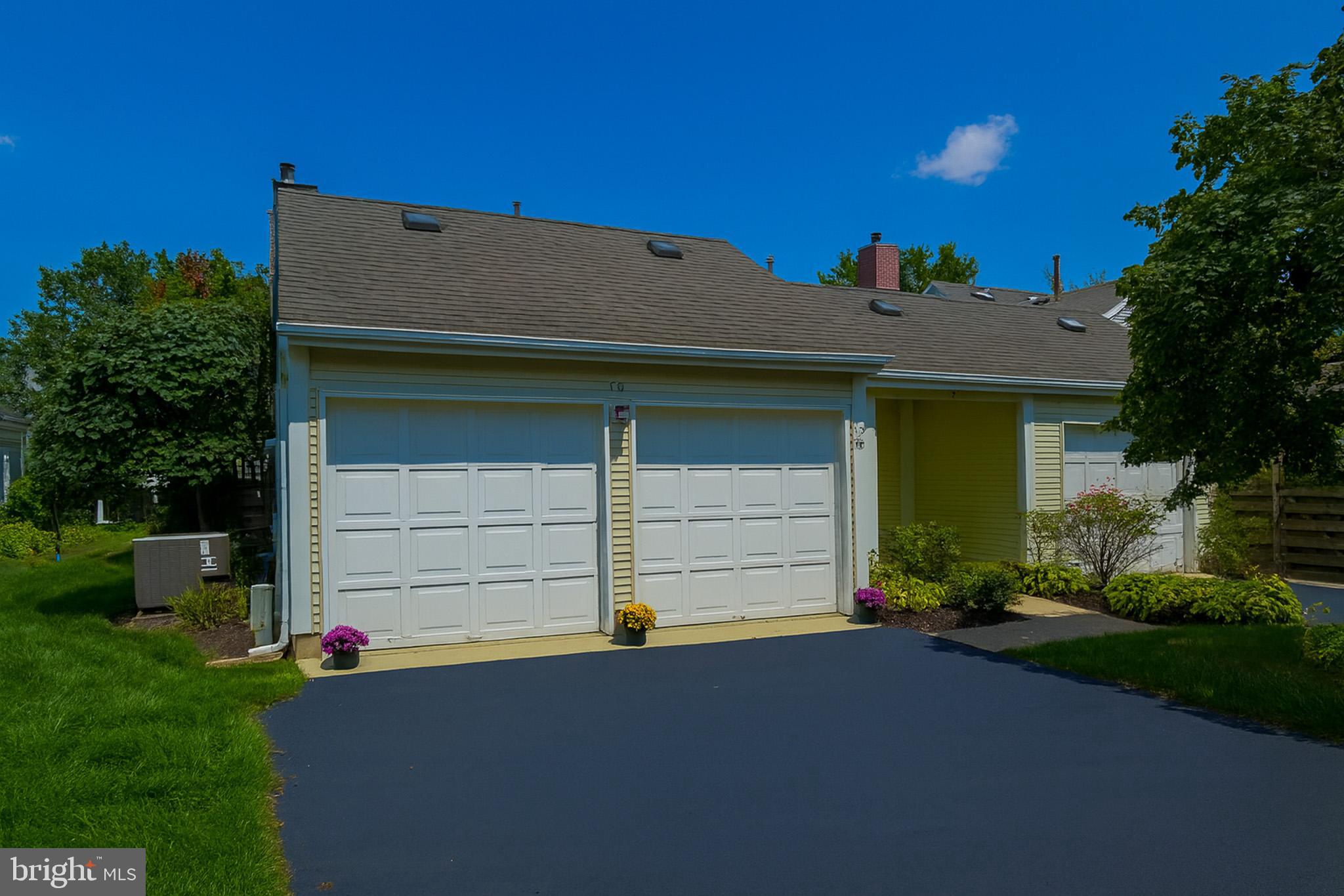 7 C Rutland Lane Monroe Township, NJ 08831 - Photo 4 of 41 a front view of a house with a yard