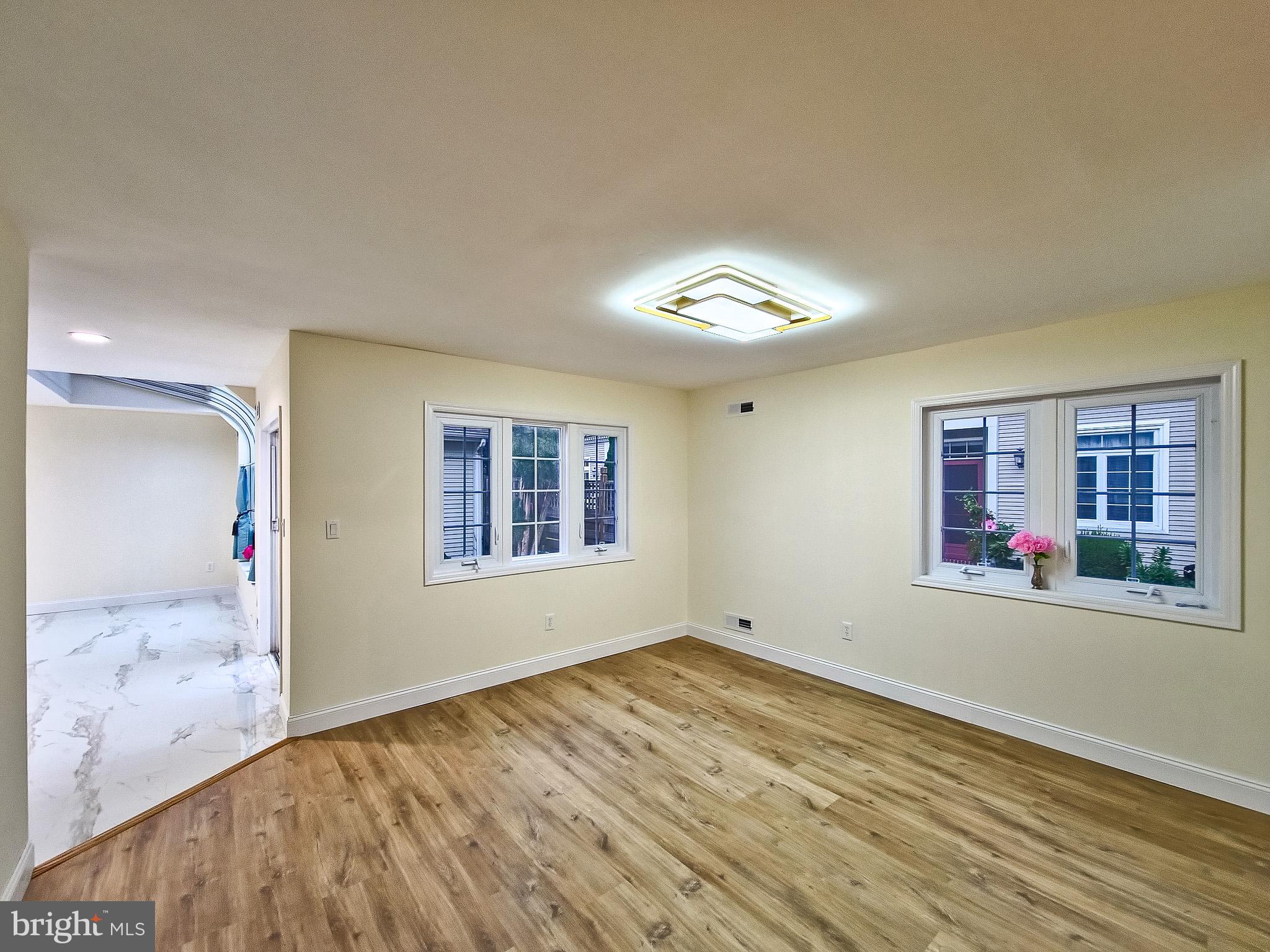 7 C Rutland Lane Monroe Township, NJ 08831 - Photo 9 of 41 a view of livingroom with natural light