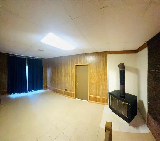 a view of a livingroom with a flat screen tv