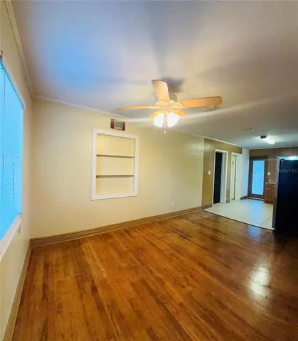 a view of an empty room and window