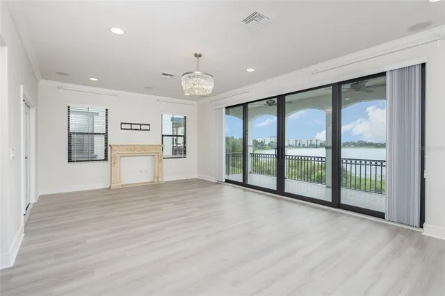 a view of a room with large windows