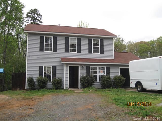 356 Sleepy Hollow Road Charlotte, NC 28217 - Photo 1 of 6 a white house with a yard and front view of a house