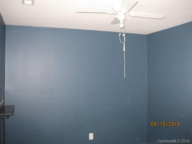 356 Sleepy Hollow Road Charlotte, NC 28217 - Photo 6 of 6 an empty room with a fan
