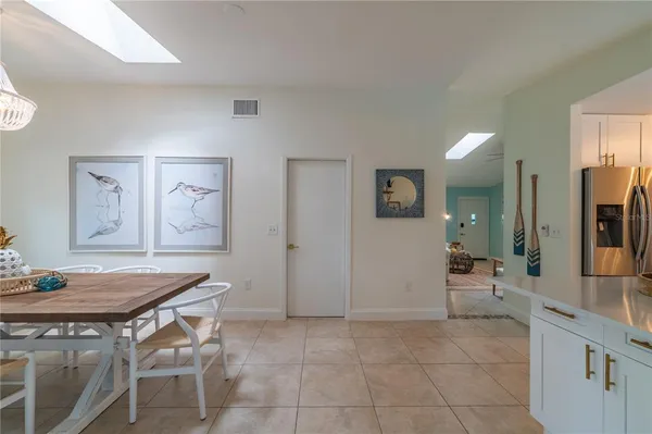 a bedroom with bed and a window