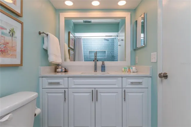 a view of swimming pool from a balcony