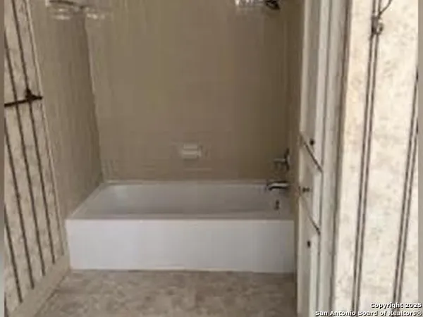 a bathroom with a bathtub