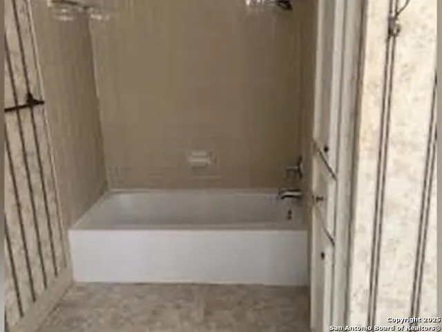 a bathroom with a bathtub