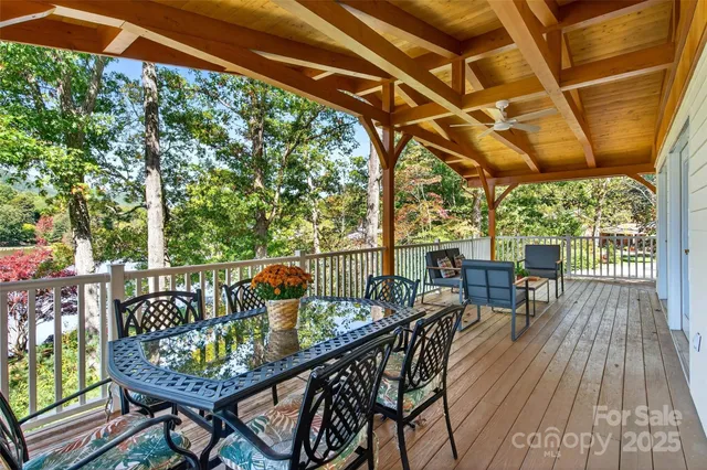 a view of a chairs and table in the patio