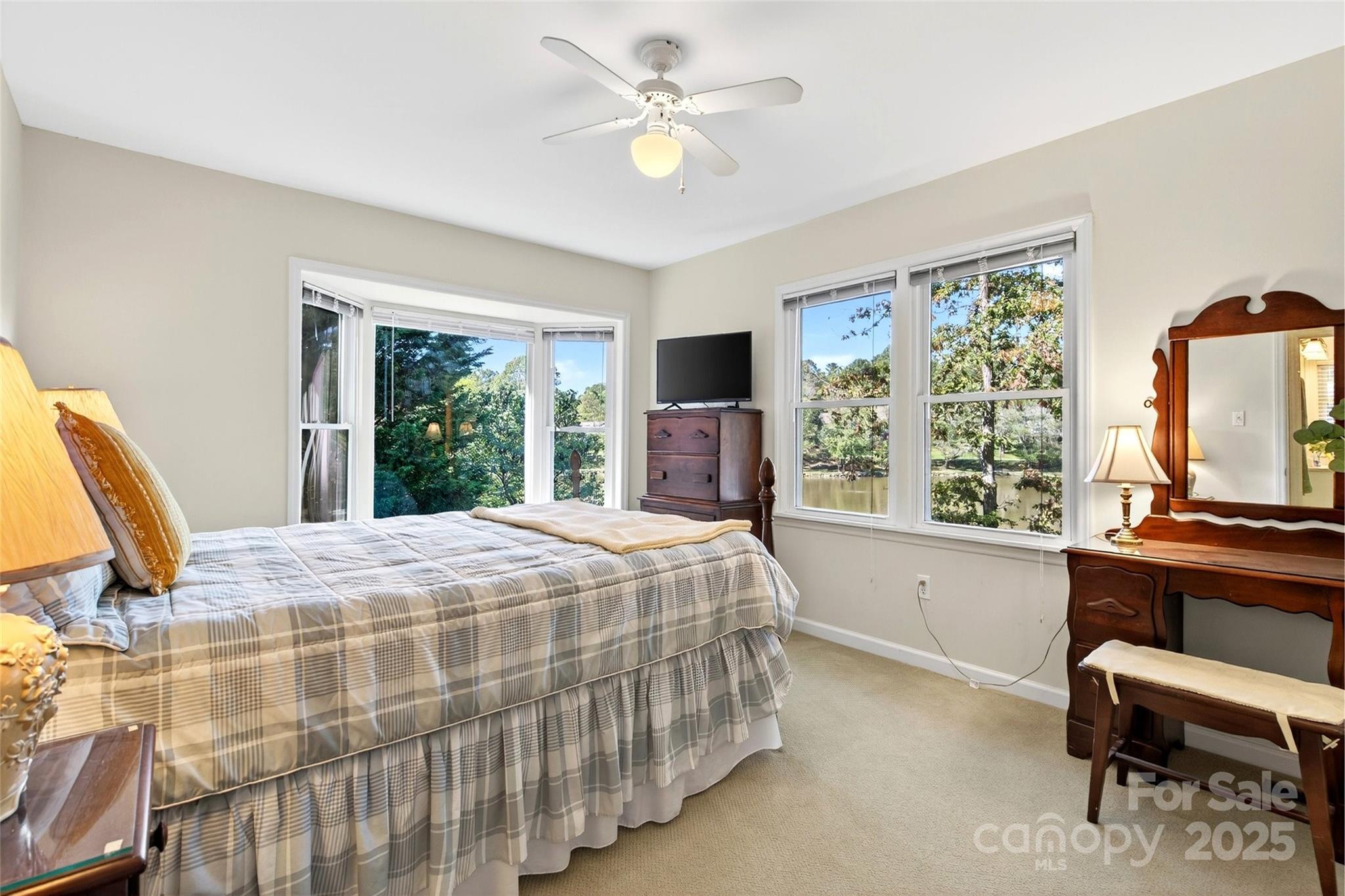 211 Rhododendron Avenue Black Mountain, NC 28711 - Photo 21 of 48 a bedroom with a bed and a desk