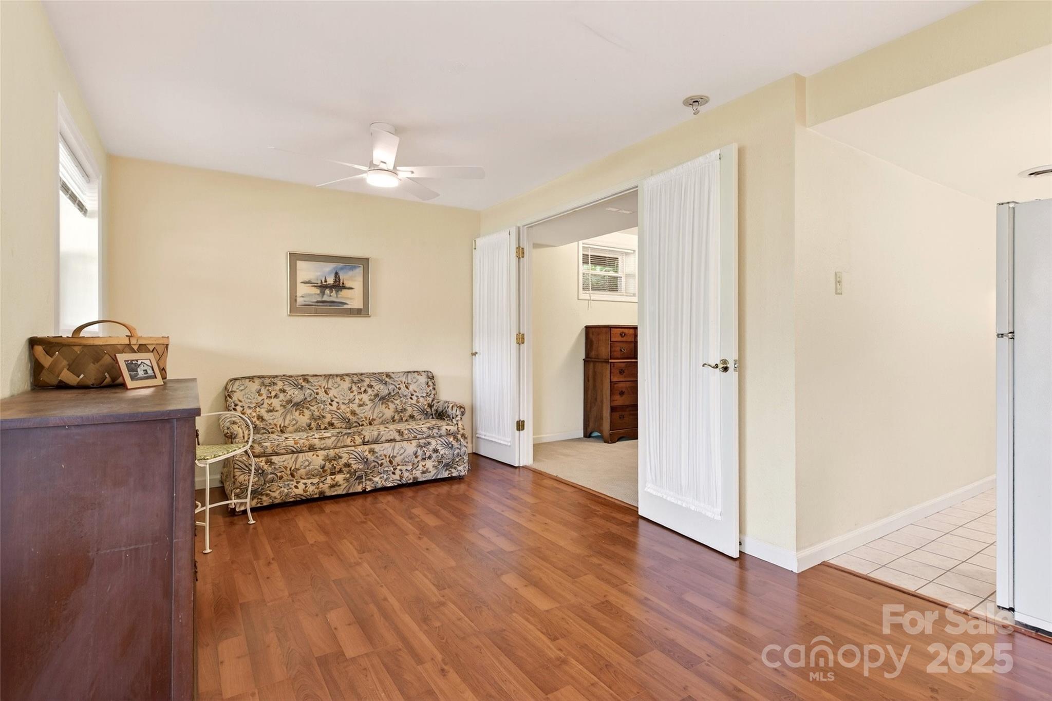 211 Rhododendron Avenue Black Mountain, NC 28711 - Photo 34 of 48 a living room with furniture and a wooden floor