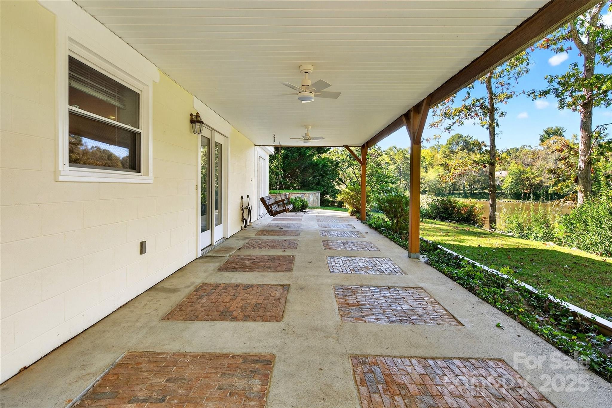 211 Rhododendron Avenue Black Mountain, NC 28711 - Photo 39 of 48 a view of a pathway along with garden