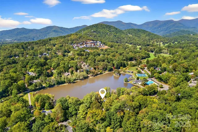 a view of a city with mountains in the background