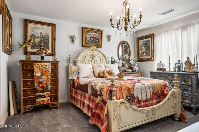 a bedroom with bed and a window