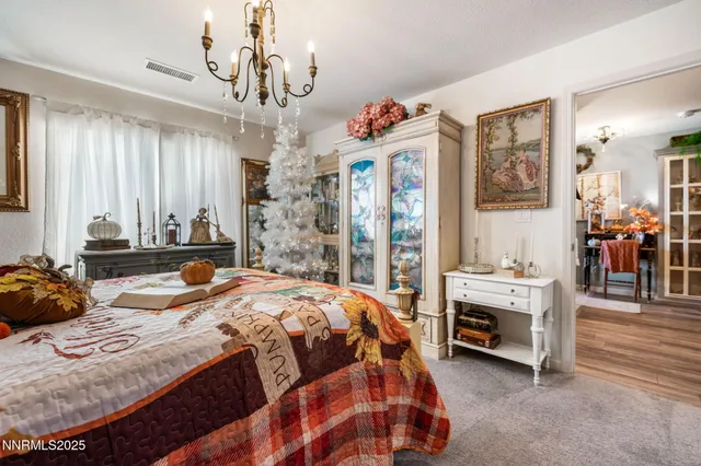 a bedroom with bed and window