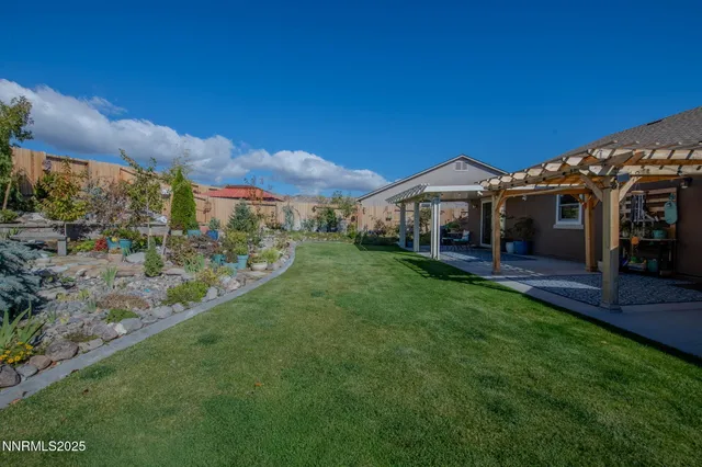 a view of a house with a big yard