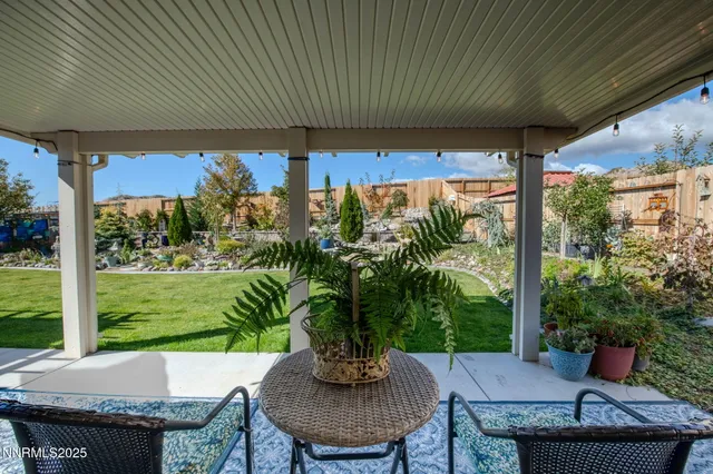 a outdoor living space with furniture and garden view