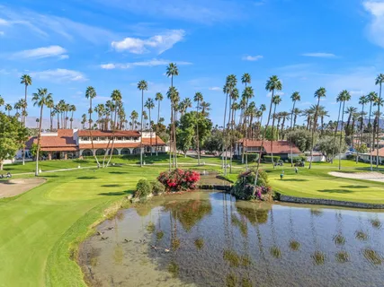 a view of a swimming pool with a lake view