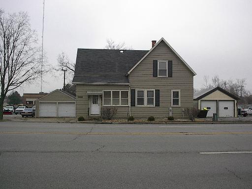 25-w579 Army Trail Road Carol Stream, IL 60188 - Photo 1 of 7 a front view of a house with a yard