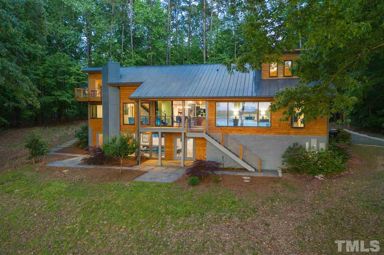 6900 Denlee Road Raleigh, NC 27603 - Photo 2 of 30 front view of a house with a yard