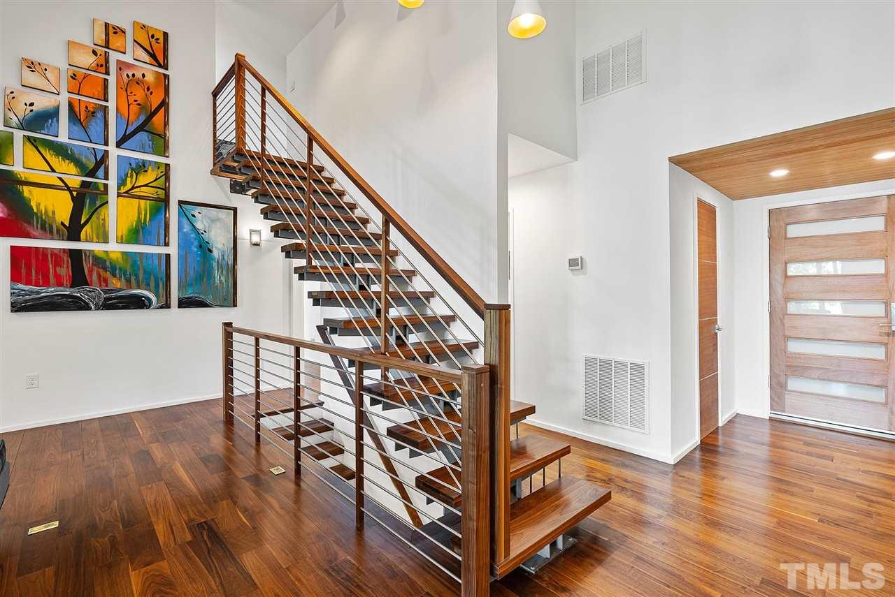 6900 Denlee Road Raleigh, NC 27603 - Photo 11 of 30 a view of an entryway with wooden floor