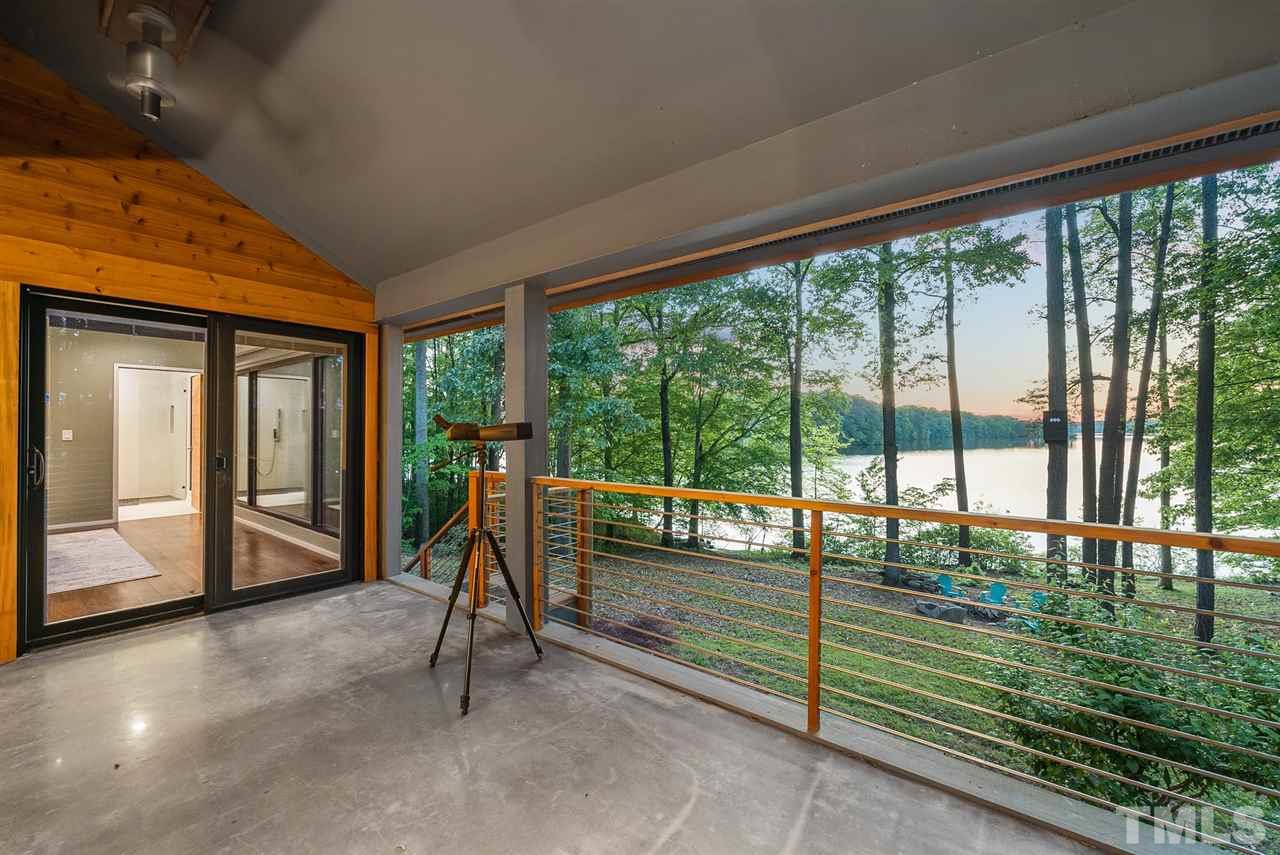 6900 Denlee Road Raleigh, NC 27603 - Photo 12 of 30 a view of a room with wooden floor and windows